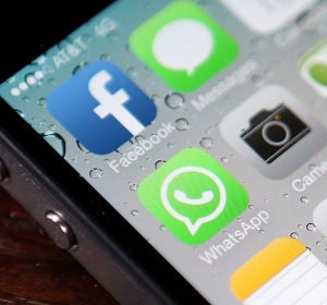 Logo de WhatsApp en un móvil Logo de WhatsApp en un móvil