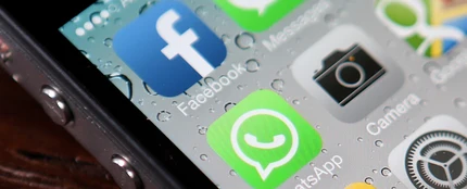Logo de WhatsApp en un móvil Logo de WhatsApp en un móvil