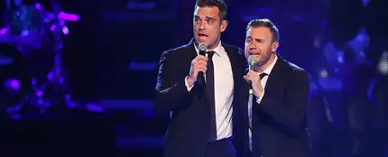 Robbie Williams cantando con su ex banda, Take That Robbie Williams cantando con su ex banda, Take That