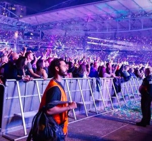 Dave Allegretti en un concierto de Coldplay Dave Allegretti en un concierto de Coldplay
