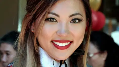 Mujer china sonriendo Mujer china sonriendo