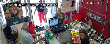 Imagen del atraco a punta de pistola frustrado en Sevilla Imagen del atraco a punta de pistola frustrado en Sevilla