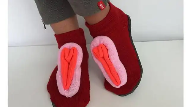 Zapatillas con forma de vagina