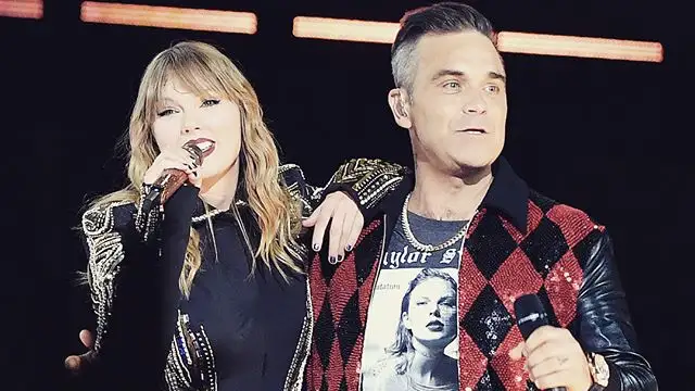 Taylor Swift y Robbie Williams cantan juntos 'Angels'