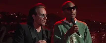 Bono y Pharrel Williams Bono y Pharrel Williams