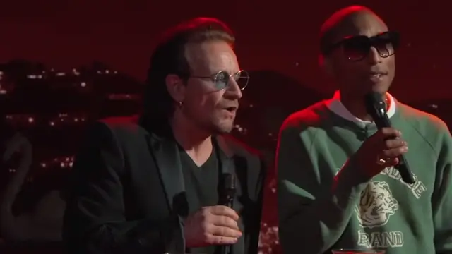 Bono y Pharrel Williams