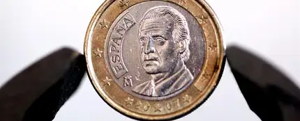 Una moneda de un euro Una moneda de un euro