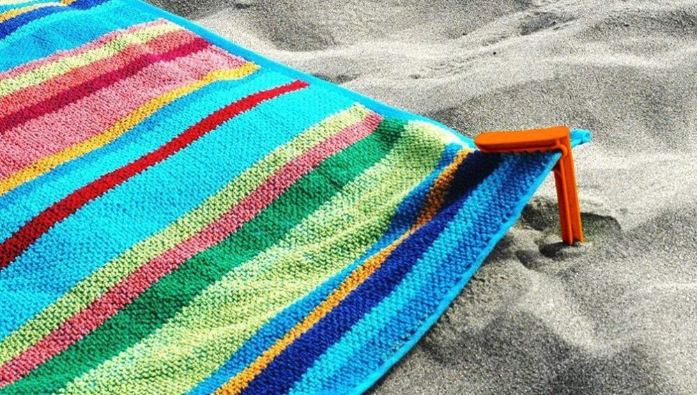 Pinza de toalla para playa