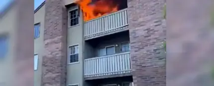 Imagen del incendio en el que el deportista salvó a un niño Imagen del incendio en el que el deportista salvó a un niño