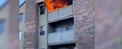 Imagen del incendio en el que el deportista salvó a un niño Imagen del incendio en el que el deportista salvó a un niño