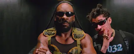 Bad Bunny junto al luchador Booker T en el videoclip de su sencillo 'Booker T' Bad Bunny junto al luchador Booker T en el videoclip de su sencillo 'Booker T'