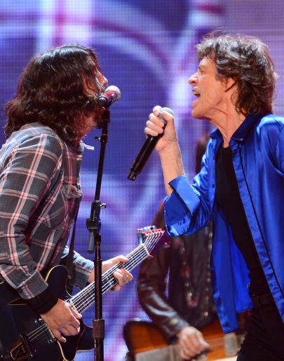 Dave Grohl y Mick Jagger durante una actuación Dave Grohl y Mick Jagger durante una actuación