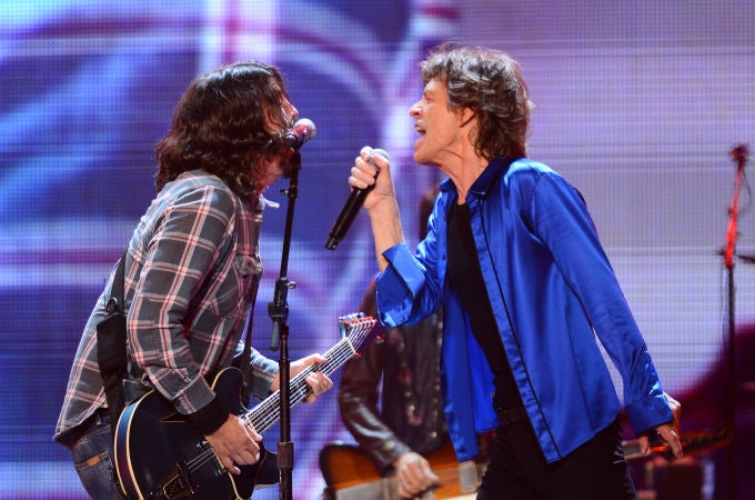 Dave Grohl y Mick Jagger durante una actuación Dave Grohl y Mick Jagger durante una actuación