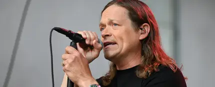 Brad Arnold en 2023 Brad Arnold en 2023