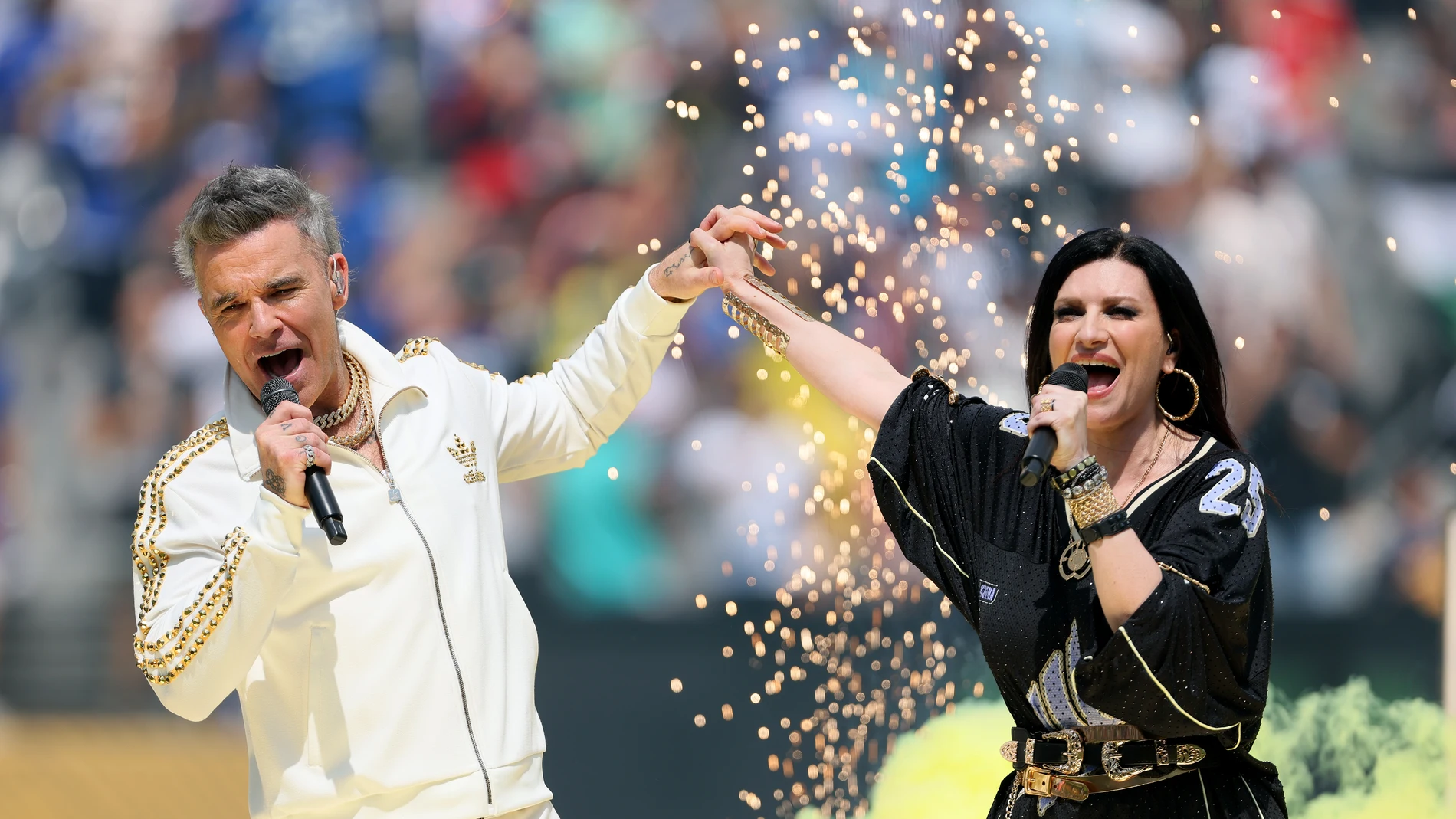 Robbie Williams y Laura Pausini Robbie Williams y Laura Pausini