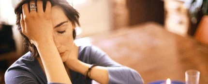 Una mujer con rostro triste. Una mujer con rostro triste.