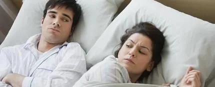 Una pareja en la cama Una pareja en la cama