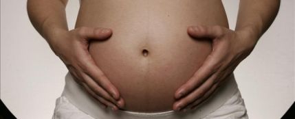 Una mujer embarazada Una mujer embarazada