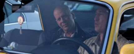 Bruce Willis en un taxi