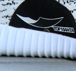Los manteros crean una marca propia, “top manta" Los manteros crean una marca propia, “top manta"