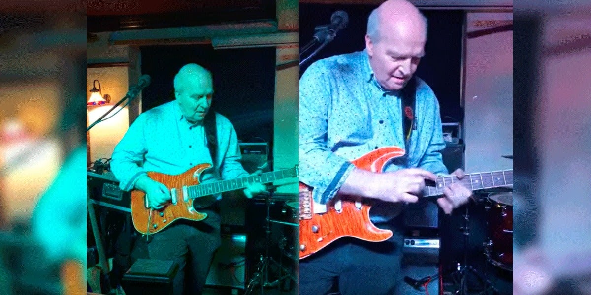Kenny Petrie tocando la guitarra eléctrica