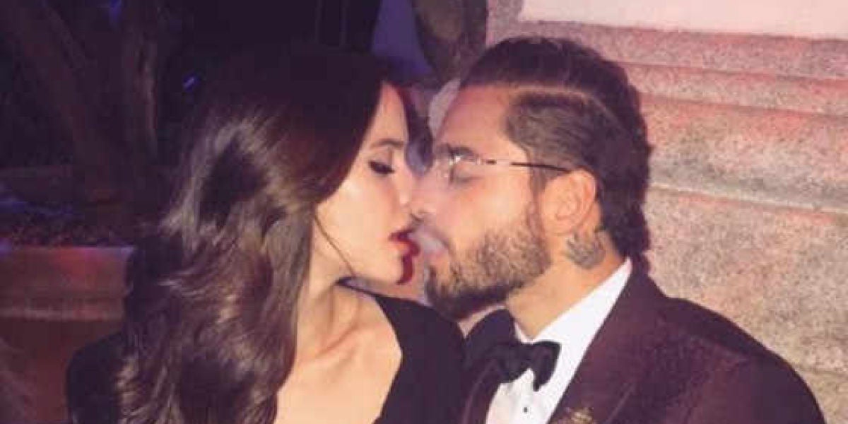 Natalia Barulích felicitando a Maluma