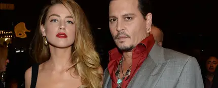 Amber Heard y Johnny Depp, en el festival de Toronto en septiembre de 2015 Amber Heard y Johnny Depp, en el festival de Toronto en septiembre de 2015
