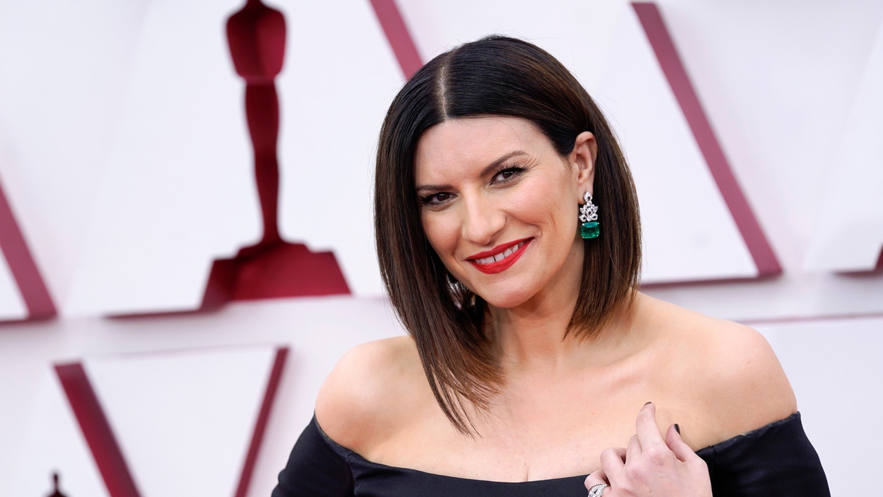 Laura Pausini’s family: her companion Paolo Carta, her daughter Paola and the father who determined her career