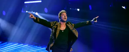 El cantante David Bisbal en su actuación en los Latin American Music Awards 2023. El cantante David Bisbal en su actuación en los Latin American Music Awards 2023.